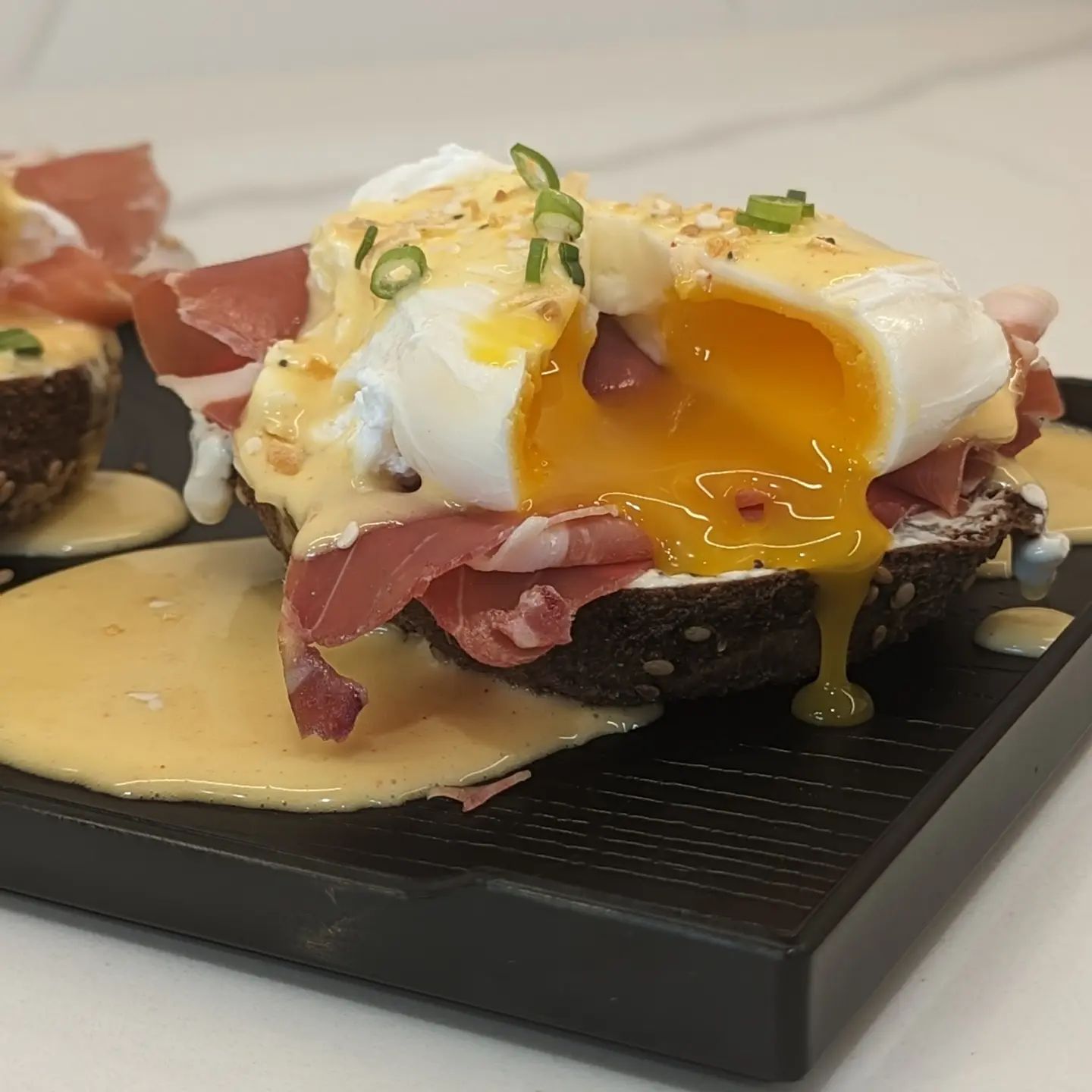 I could eat eggs Benedict every dayThis was the Benedict I shared in my giveaway, if you missed the giveaway, I apologize and hope to do another one soon! This is a @foxhillkitchens bagel, @laterrafina everything bagel dip, prosciutto, a perfectly poached egg and blender hollandaise sauce. Making the hollandaise in the blender is the way to go. So much easier! What is your dream eggs Benedict?#eggsbenedict #breakfast #brunch #bestbreakfast #eggs #poachedeggs