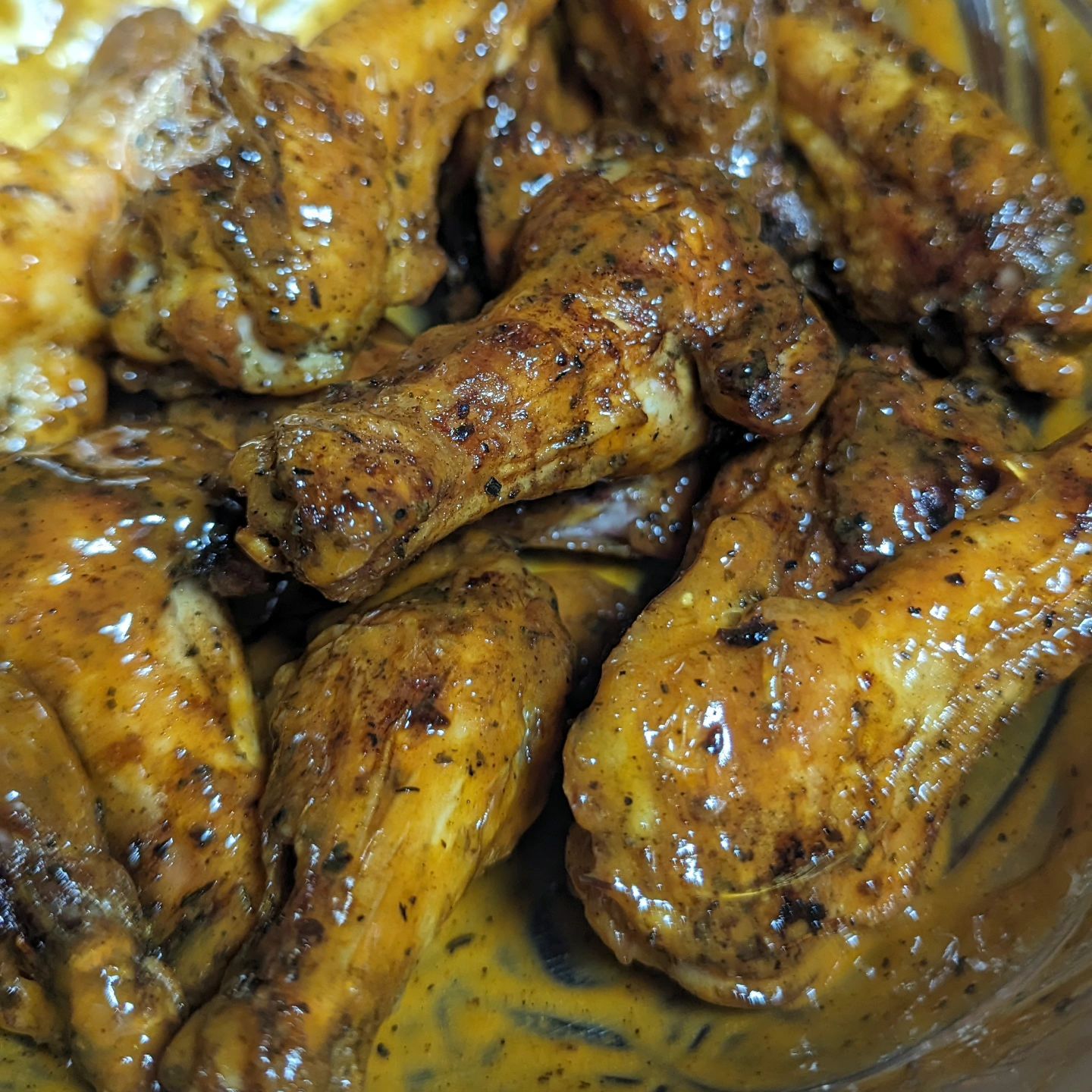 Maybe my easiest buffalo chicken wing Wednesday yet.@sprouts Cajun butter wings, Into the smoker at 350 till they hit 165 internal, then I bumped them temp to 425 and pulled them when they looked nice and crispy(202 internal). Tossed the wings in @primalkitchenfoods buffalo sauce and I was done. Brought the bowl to the table, another bowl for the bones and a paper towel for those saucy hands. @bearmountainbbq hickory pellets for fuel kept the heat coming and burned so efficiently that even at the 350-425 temps very few pellets were needed and almost no ash in the smoker. IYKYK.#chickenwings #wingwednesday #buffalowings #bearmountainbbq