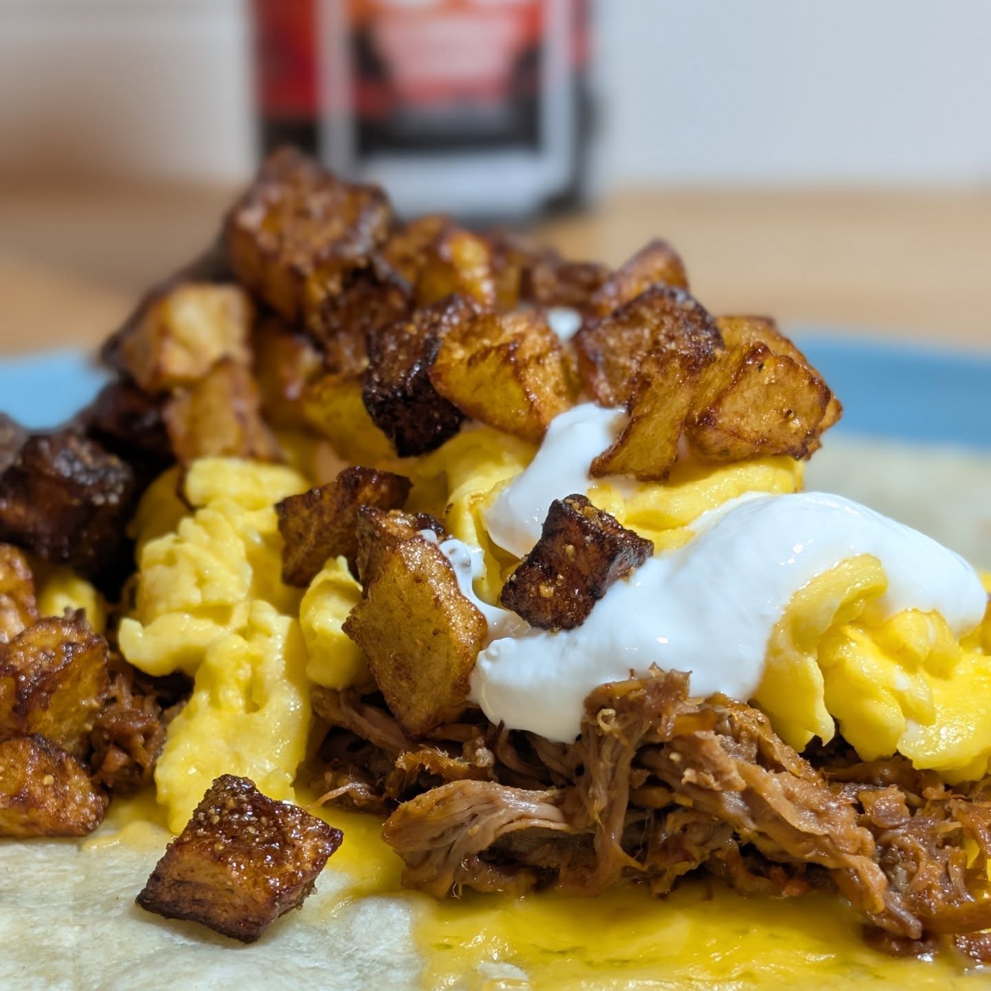 How do you prefer your birria? When you make a big batch of Birria, you get to enjoy it in multiple formats! Quesadilla, breakfast burrito, or a little hash? Which would you pick? The breakfast burrito is golden potatoes, fried and tossed in @spiceology cowboy candy, some scrambled eggs, birria, cheddar cheese and some sour cream. The quesadilla is simply a flour tortilla, with quesadilla cheese and birria, painted in consume and cooked on the flat top. Finally. After the burrito I had a few leftovers that didn't fit in the tortilla, so a little breakfast hash? The rest of the potatoes, eggs, cheese,  Birria and some hot sauce#birria